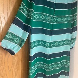 Green long sleeve dress. Used, but in really good condition